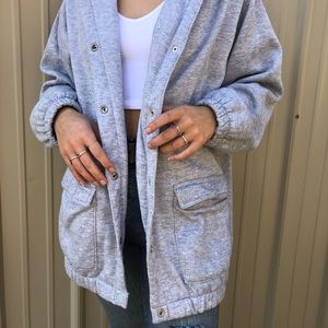 Grey jacket.